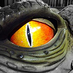 huge blinking eye of this animatronic dinosaur crocodile